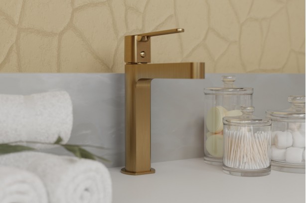 Hanaé freestanding single lever basin mixer in brushed gold - side view