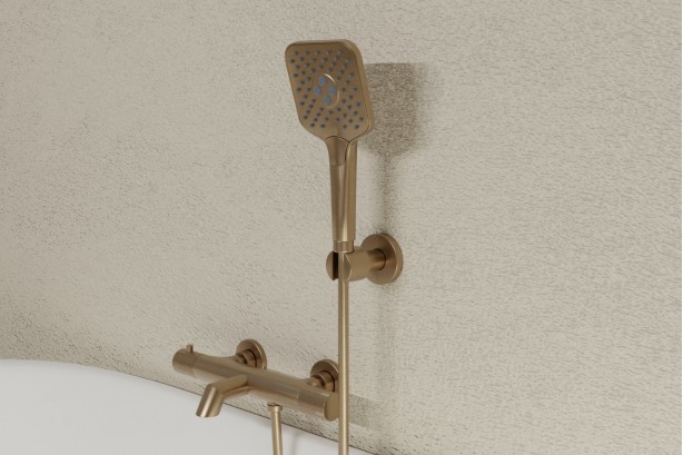 Drakar thermostatic mixer in brushed gold - view of the knob