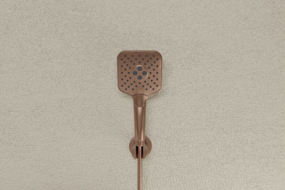 Hanaé hand shower in brushed copper - front view