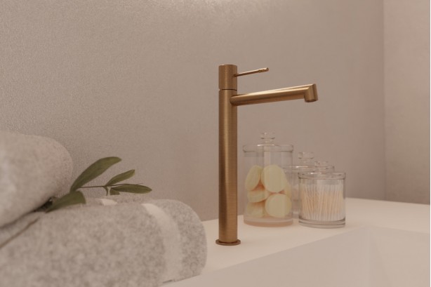 Drakar single lever basin mixer in brushed gold - high version - side view