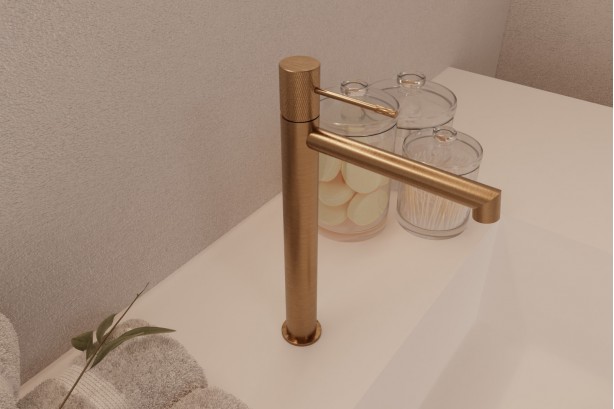 Drakar single lever basin mixer in brushed gold - high version - side view